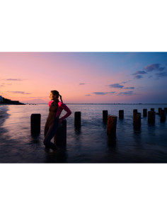 woman leaning on wooden posts at sunset by the water, captured with Nikon NIKKOR Z 24-70mm f/2.8 S II Lens woman leaning on wooden posts at sunset by the water, captured with Nikon NIKKOR Z 24-70mm f/2.8 S II Lens