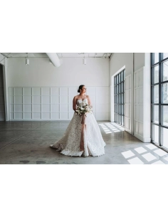 Bride holding bouquet in bright minimalist space, captured with Fujifilm XF 16-55mm f/2.8 R LM WR II Bride holding bouquet in bright minimalist space, captured with Fujifilm XF 16-55mm f/2.8 R LM WR II