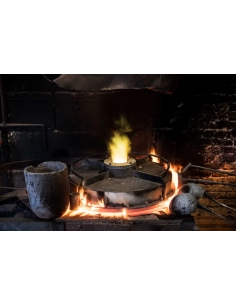 Molten metal being poured in a workshop, with glowing flames and tools ar, captured with Fujifilm XF 16-55mm f/2.8 R LM WR II Molten metal being poured in a workshop, with glowing flames and tools ar, captured with Fujifilm XF 16-55mm f/2.8 R LM WR II