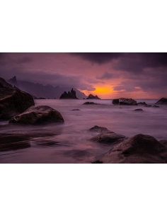 Serene seascape with rocky shore and a vibrant sunset, captured with Tamron 35-150mm f/2-2.8 Di III VXD Lens for Nikon Serene seascape with rocky shore and a vibrant sunset, captured with Tamron 35-150mm f/2-2.8 Di III VXD Lens for Nikon