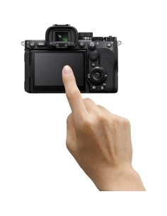 A hand reaching for the camera screen in a bright setting, captured with Sony Alpha 7 V – Full Frame Mirrorless Camera A hand reaching for the camera screen in a bright setting, captured with Sony Alpha 7 V – Full Frame Mirrorless Camera