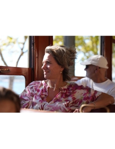 Woman enjoying a sunny day on a tram, with soft sunlight filteri, captured with Sony Alpha 7 V – Full Frame Mirrorless Camera Woman enjoying a sunny day on a tram, with soft sunlight filteri, captured with Sony Alpha 7 V – Full Frame Mirrorless Camera
