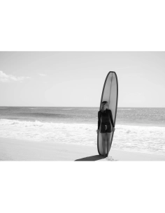 A woman holding a surfboard on a beach, with waves in the background, captured with Nikon Z 70-200mm f/2.8 VR S II A woman holding a surfboard on a beach, with waves in the background, captured with Nikon Z 70-200mm f/2.8 VR S II