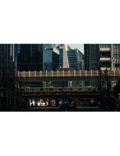 Urban scene with train passing through city skyscrapers, captured with Canon EOS R6 V Camera Body Urban scene with train passing through city skyscrapers, captured with Canon EOS R6 V Camera Body