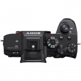 Top view of Sony Alpha 7R IVA mirrorless camera body with dials and buttons visible Top view of Sony Alpha 7R IVA mirrorless camera body with dials and buttons visible