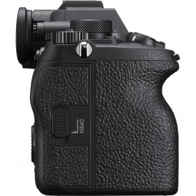 Sony Alpha 7 IV mirrorless camera body side view with textured grip and open access door Sony Alpha 7 IV mirrorless camera body side view with textured grip and open access door