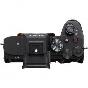 Sony Alpha 7 IV mirrorless camera body showing top view with control dials and hot shoe Sony Alpha 7 IV mirrorless camera body showing top view with control dials and hot shoe