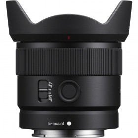 Sony E 11mm F1.8 lens with E-mount, showing focus switch and hood Sony E 11mm F1.8 lens with E-mount, showing focus switch and hood