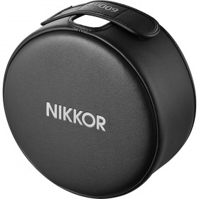 Nikon Z 600mm f/4 TC VR S lens cover, black leather case with NIKKOR branding, top view Nikon Z 600mm f/4 TC VR S lens cover, black leather case with NIKKOR branding, top view