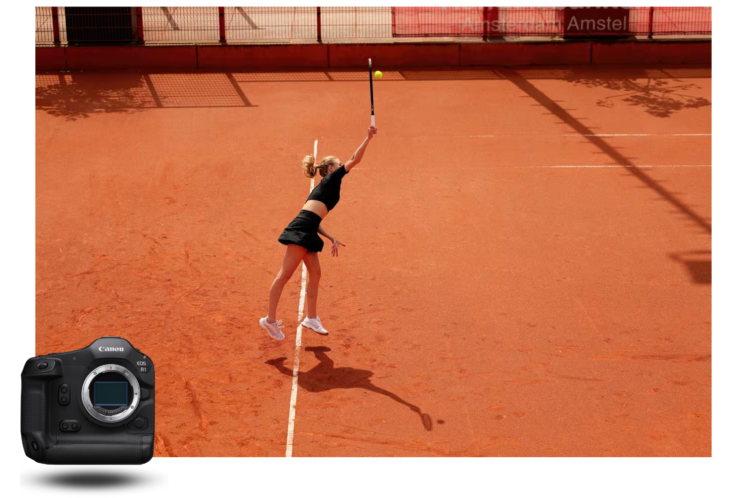 Tennis player captured mid-serve with the Canon EOS R1 on a clay court