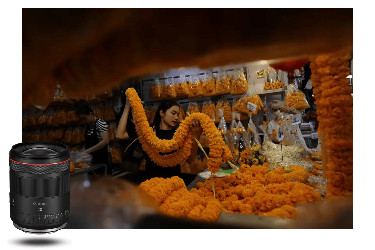 Escena de mercado de flores en Asia capturada con el Canon RF 20mm f/1.4 L VCM, ilustrando la riqueza de los colores y la precisión del enfoque en un entorno urbano.