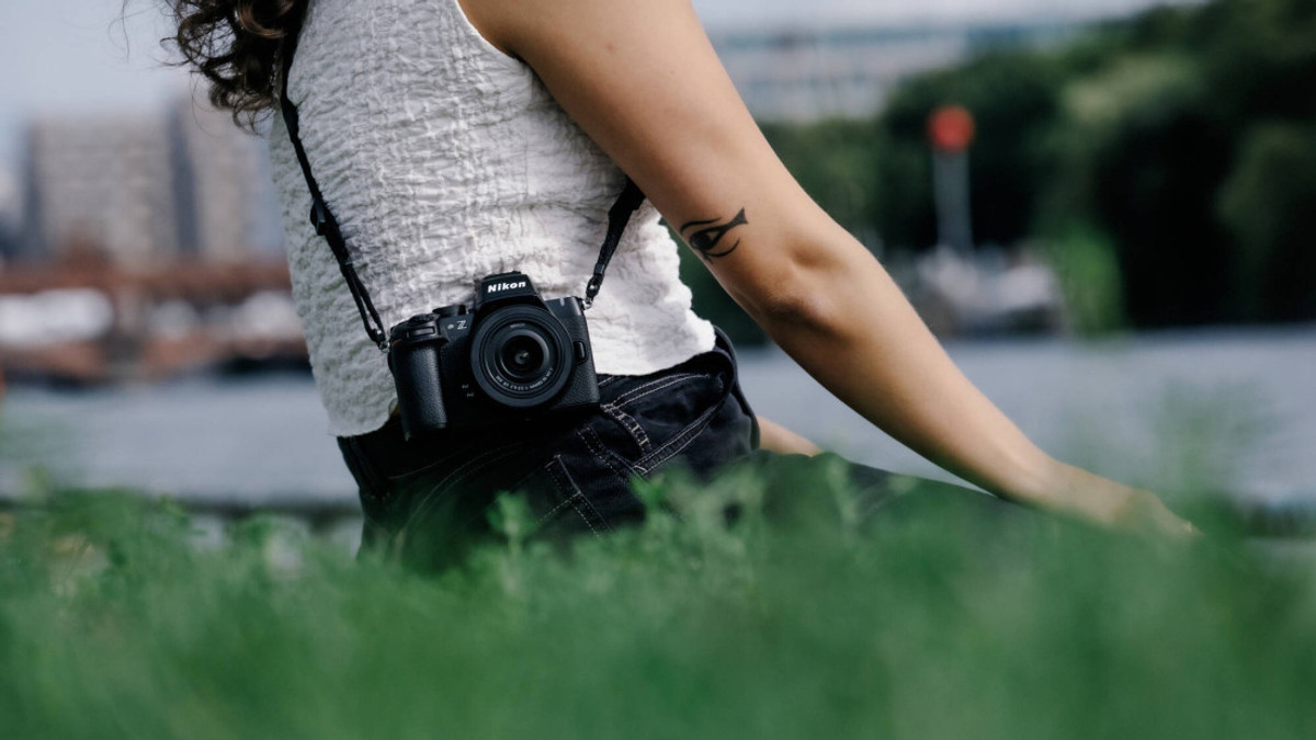 Nikon Z50II carried on a shoulder strap during a travel photography outing