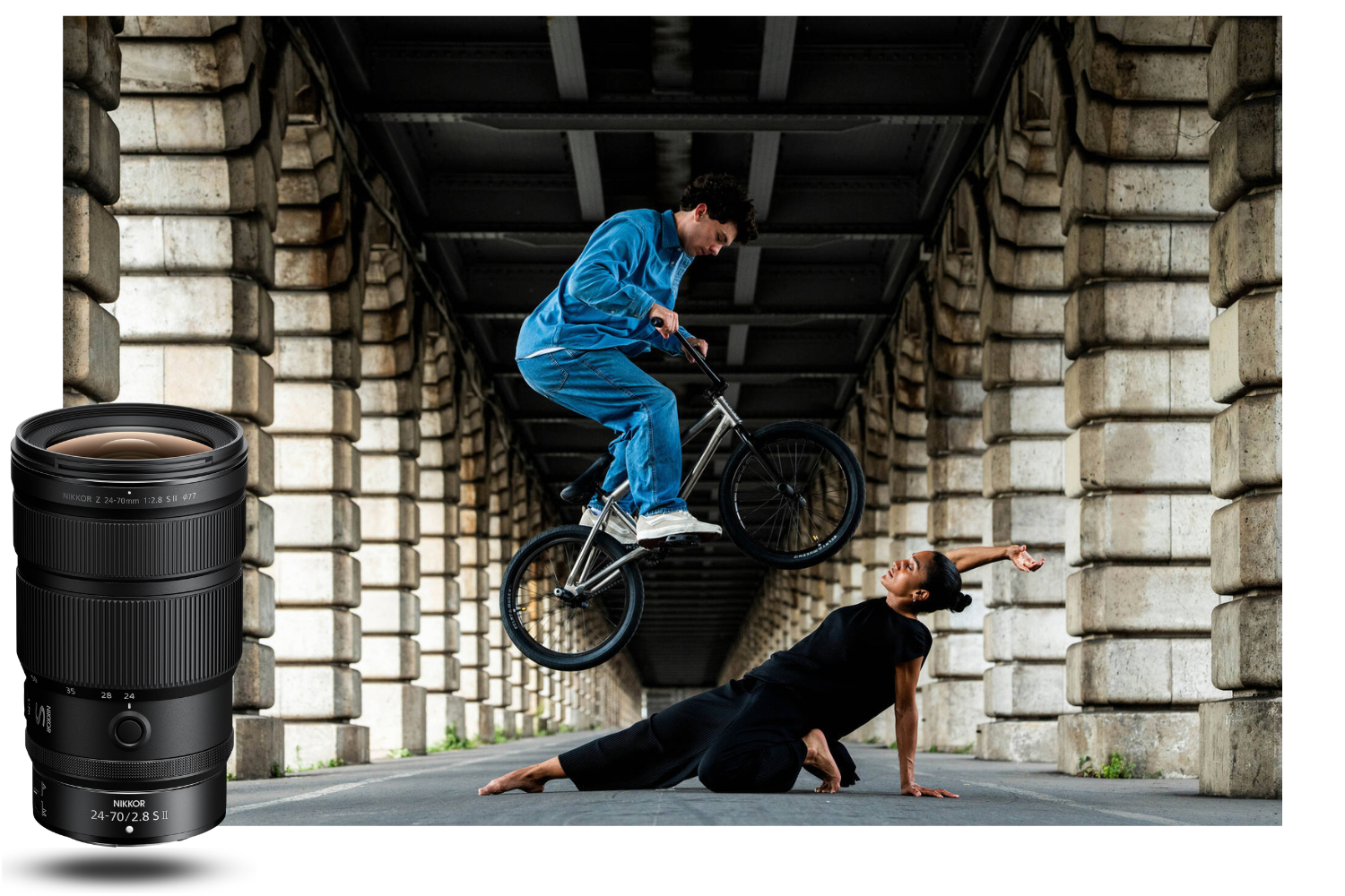 urban scene captured with the Nikon Z 24-70mm f/2.8 S II, cyclist in motion and dancer under a bridge